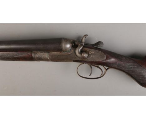 A deactivated 12 bore double barrel shotgun by CS Griffiths, Skipton. With Birmingham Proof House Deactivation Certificate. C