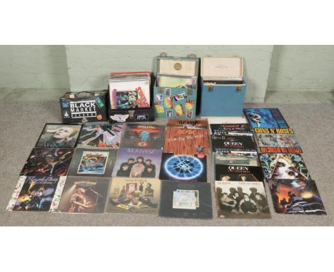 Three cases of vinyl LPs records with various genres, including Queen, Motorhead, David Bowie, John Lennon, David Bowie, Blon