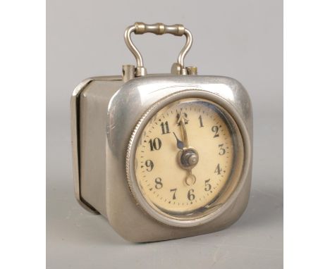 German Wecker alarm clock of typical form in white metal case, 6cm tall.