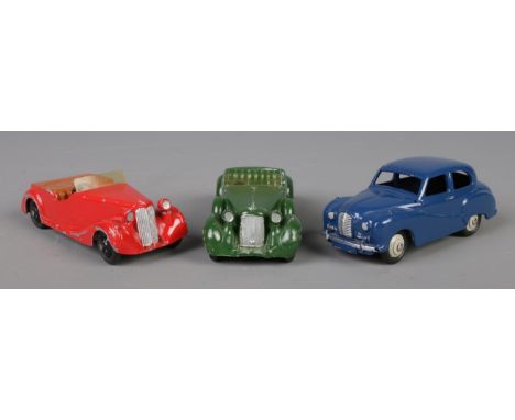 Three Dinky Meccano diecast model cars; deep blue Austin Somerset 40J, green Lagonda 38C and red Sunbeam Talbot 38B. Longest 