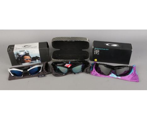 Three pairs of Oakley fashion sunglasses to include boxed Juan Pablo Montoya signature and boxed London 2012 Olympics edition