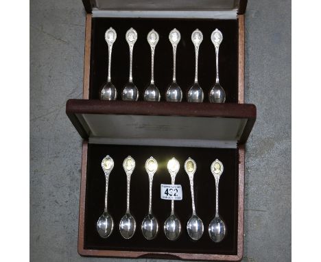 The Sovereign Queens Spoon Collection Members Edition, a set of six silver spoons inset with gilded portrait cameo, boxed, an