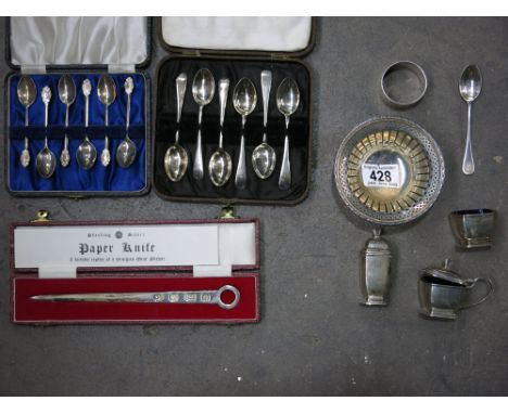 Silver including a three piece cruet, reticulated pedestal bowl, a paper knife, cased teaspoons, napkin ring, etc