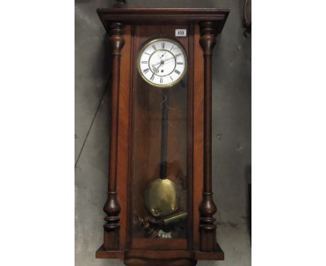 A stained walnut cased Vienna style wall clock, white enamelled dial with roman numeral chapter ring, together with a mahogan