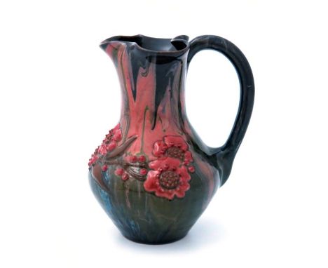 Edmund Harry Elton for Sunflower Pottery, an Elton Ware jug, baluster form with crimped rim, slip decorated and incised with 