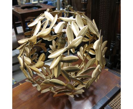 A contemporary pendant light fitting, globe form with gilt metal openwork foliate decoration