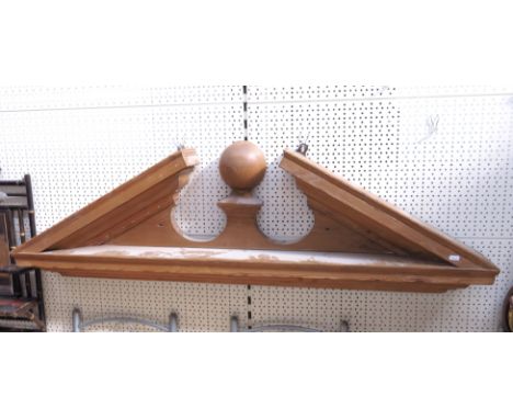 An architectural pine broken pediment, 140cm wide.