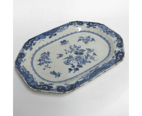 A Dublin Delft blue and white tureen stand by Henry Delamain, decorated with Chrysanthemums and foliage, marks to base, 38cm 