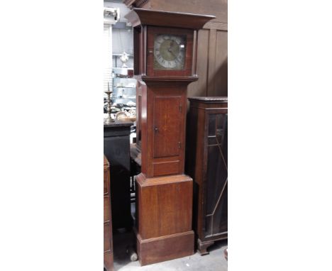 An 18th Century country oak longcase clock, plain cornice, brass dial with silvered chapter ring, Roman numerals, 194cm high,