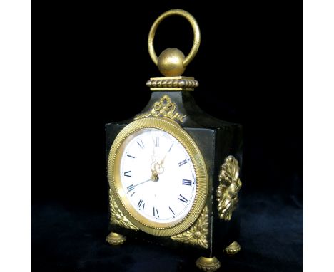 A marbled lacquer and gilt metal mounted alarm clock