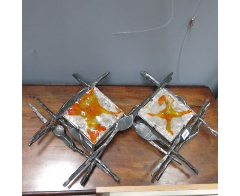 A Contemporary cast iron wall light fitting with square moulded opaque and orange patterned glass panels