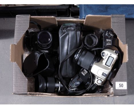 A Collection of 35mm camera and lenses, including Nikon F301 with Nikon lens, Nikon F301 camera body, 133mm series E, a Nikon