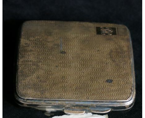 A George VI silver cigarette case, Birmingham 1936, engine turned, monogrammed.
