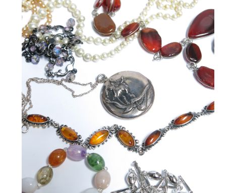 A collection of costume jewellery, including a Wedgwood  silver ring, synthetic pearl necklaces, brooches, bracelets, earring