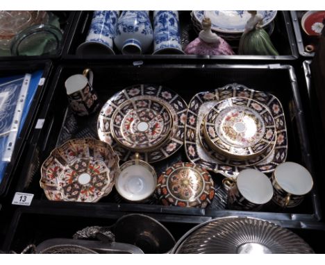 Assorted Royal Crown Derby Imari tea and coffee wares, including 2825 wavy rim bowl, 2451 cups, saucers and side plates, 1128