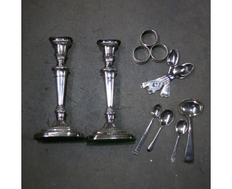 Silver to include napkin rings, sauce ladle, teaspoons (some cased) etc, a pair of plated candlesticks