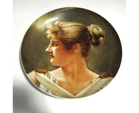 G.A. Purkis, an Aesthetic Movement painted plaque, 1884, portrait of Mifs Mary Anderson, a woman in profile, monogramed on re