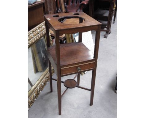 A George III mahogany washstand, circa 1800, square top, shelf and drawer below, undertier with X stretcher, 77 by 36 by 36cm