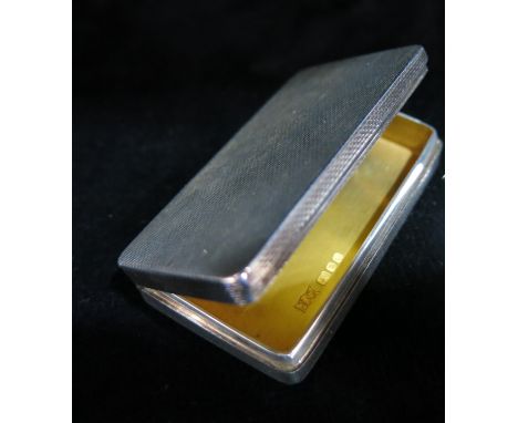 Elizabeth II silver pill box, engine turned cuboid form