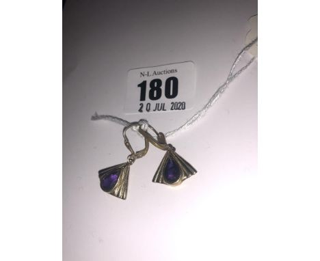 A pair of 9ct gold and amethyst earrings
