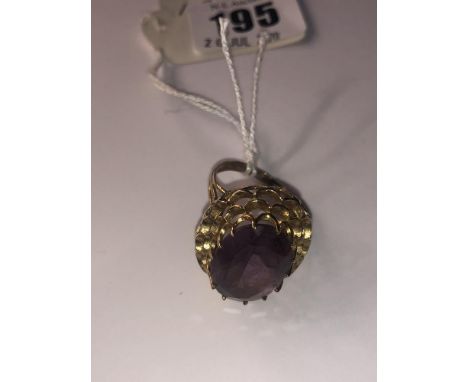 A 9ct gold and amethyst ring
