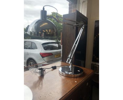 A contemporary angle poise lamp