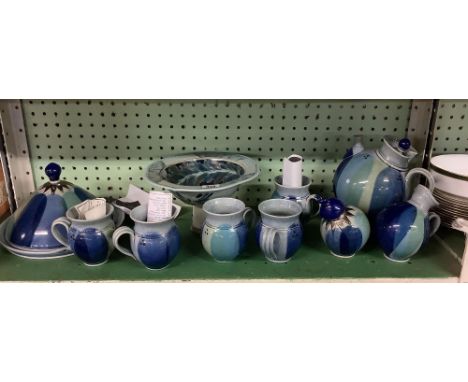 A SHELF OF JULIA LAND GLAZED POTTERY