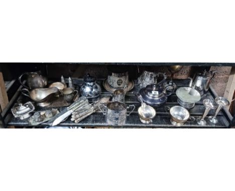 SHELF OF MISC PLATEDWARE INCL; TEA POTS, WATER POTS, CUTLERY, SPILL VASES