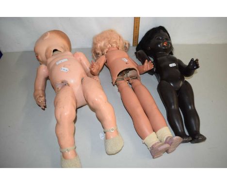 Three vintage dolls