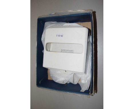 A vintage Jeyes toilet paper dispenser