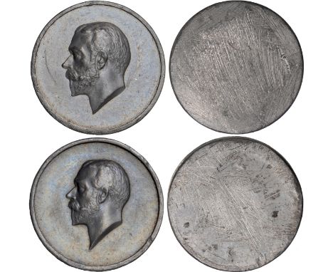 British Coins, George V, Postage, a pair of small lead portrait impressions from postage embossing tools made by the Royal Mi