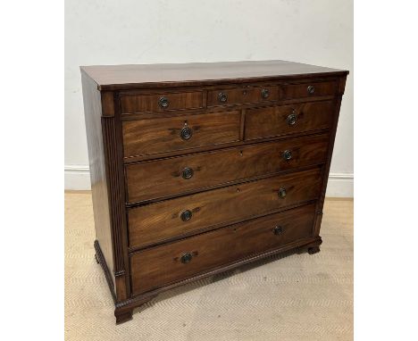 An early 19th century mahogany chest, with fluted side pilasters, on ogee bracket feet, height 109, width 123cm, depth 54cm.