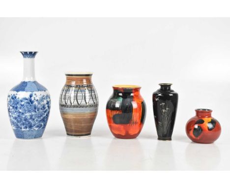 Two Poole Pottery vases, a baluster vase signed to base 'C Howell', a blue and white floral decorated vase and a cloisonné va