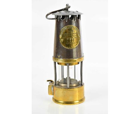 PROTECTOR LAMP &amp; LIGHTING CO LTD; a Type SL brass miner's lamp, with name plaque, height 23cm.