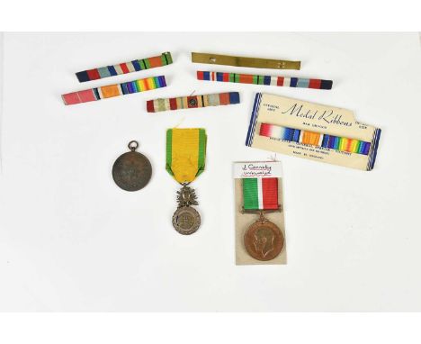 A George V For War Service Mercantile Marine Medal awarded to John Connolly, a Cheshire Regiment bronze sports medal and a Fr