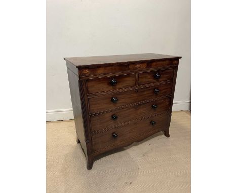 A 19th century inlaid mahogany chest of two short over three long drawers, on bracket feet, width 126cm, depth 56cm, height 1