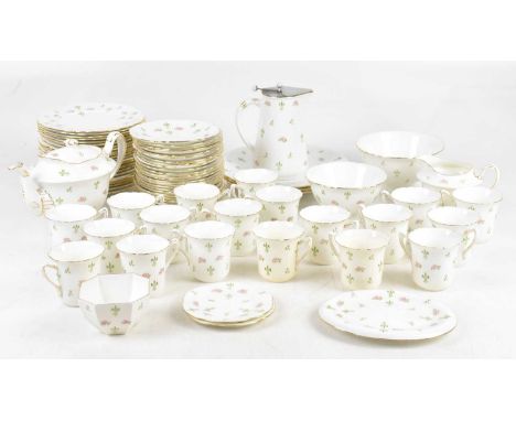 WILEMAN FOLEY; a seventy-eight piece part tea service, decorated with fleur-de-lys and roses (78).
