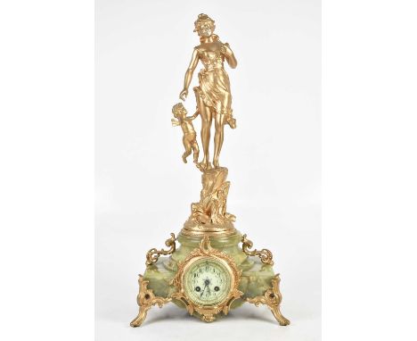 A large late 19th century figural mantel clock, the gilt spelter figure of a maiden beside cherub above the onyx stepped base