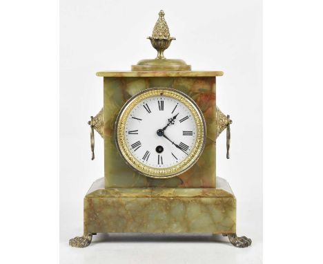 An early 20th century onyx mantel clock, with gilt metal pineapple above the enamel dial set with Roman numerals terminating 