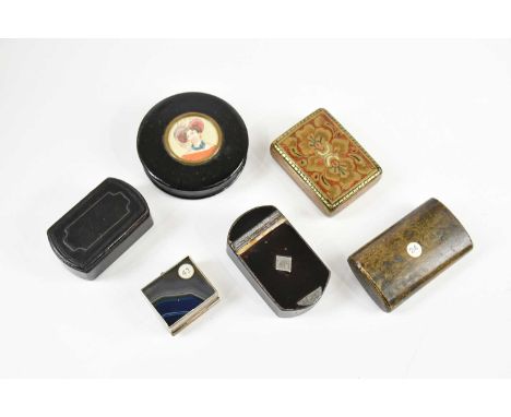 Six Victorian and later snuff boxes including a circular papier-mâché example, with printed portrait of a maiden with feather