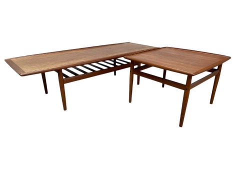 A mid century teak 'Long John' style rectangular coffee table with slatted undertier shelf, length 163cm, width 60cm, and a s
