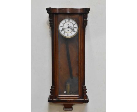 A late 19th century Vienna style wall clock, the enamel dial set with Roman numerals and second dial, height 94cm.