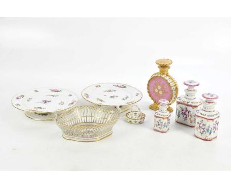 A pair of French, possibly Paris porcelain, comports, with hand painted floral decoration, a Dresden twin handled reticulated
