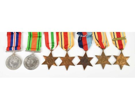 A collection of WWII medals comprising the 1939-45 Star, the Africa Star with Eighth Army bar, the Africa Star, the Italy Sta