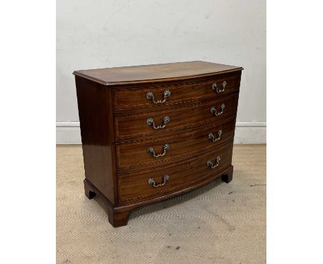 A 19th century inlaid mahogany bowfront chest of four drawers, on bracket feet height 80cm, width 94cm, depth 50cm.