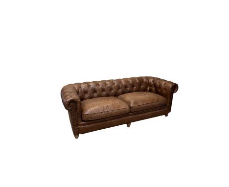A modern brown leather Chesterfield style three seater sofa, length 206cm, depth 90cm.
