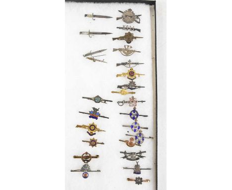 A collection of twenty-two military badges, including some white metal examples, to include Lancashire Fusiliers, Royal Tank 