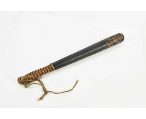 A black painted Victorian truncheon, length 41cm.