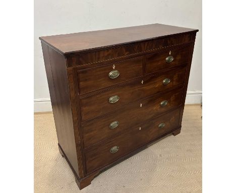 An early 19th century mahogany chest with two short and three long drawers, on bracket feet, height 122cm, width 133cm, depth