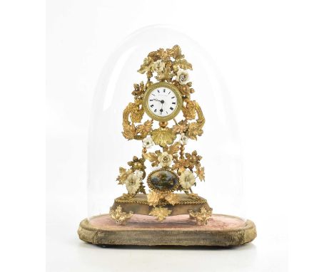 A circa 1900 gilt metal and ceramic mounted mantel clock, with scrolling and floral detail, the enamel set with Roman numeral